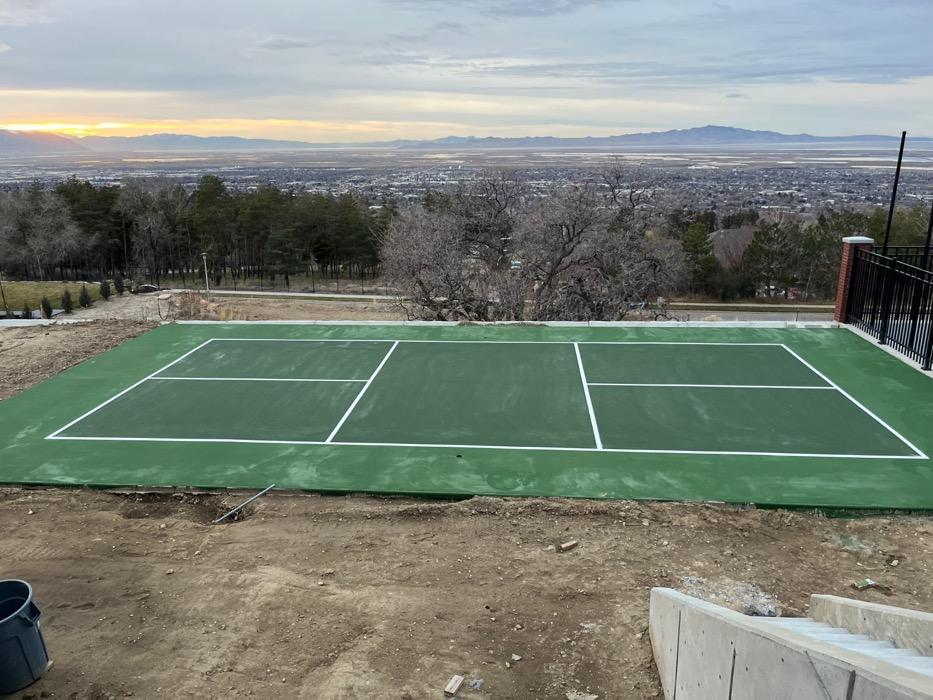 Multi-sport court in The Avenues, Salt Lake City, built on a retained slope above the valley.